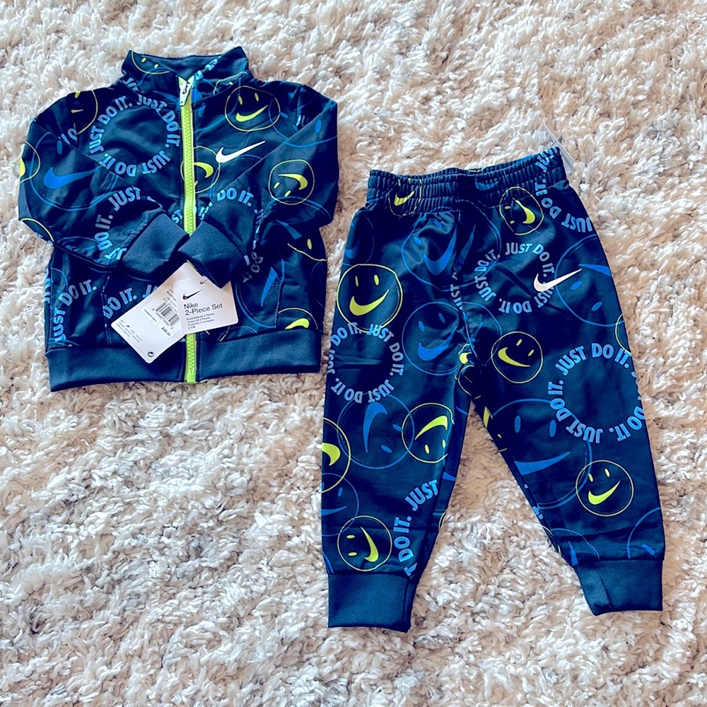 NWT Nike Boys 12 month blue and green matching zip up jacket and pants.